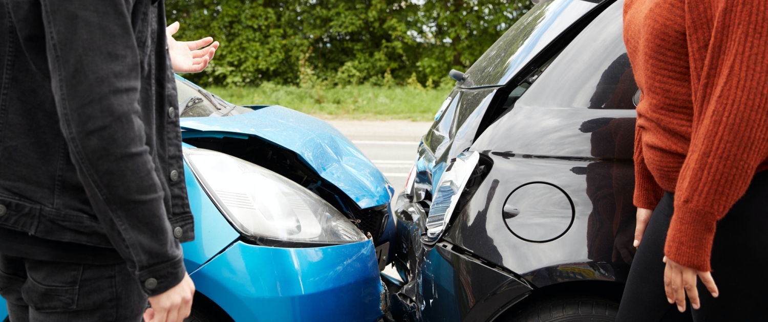 Two Angry Motorists Arguing Over Responsibility For Car Accident